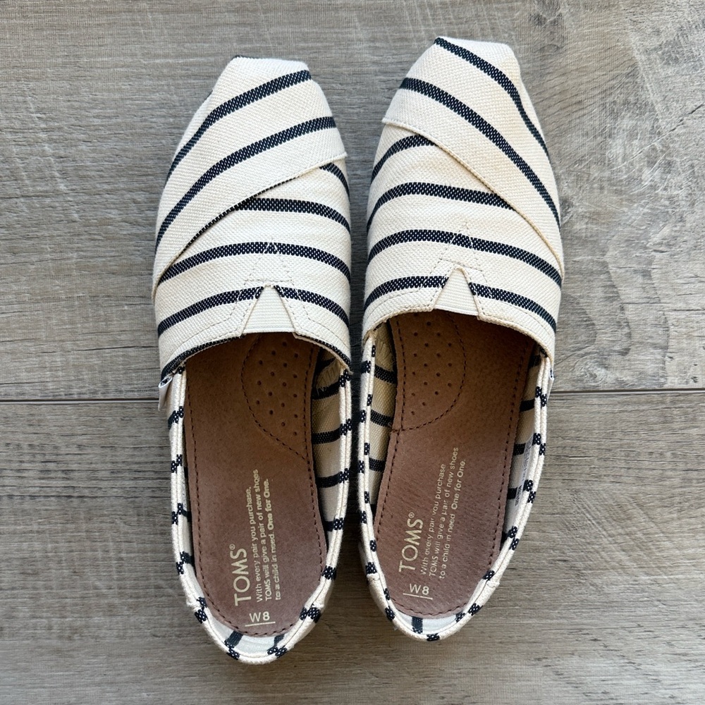 TOMS Black and White Striped Canvas Slip-Ons